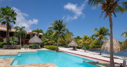 Just at the frontline of Spanish Water in a beautiful resort