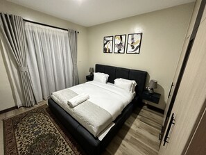 1 غرفة نوم ومكواة/لوح كي وواي فاي مجانًا وملاءات أسرّة