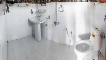 Deluxe Double Room | Bathroom | Shower, designer toiletries, slippers, towels
