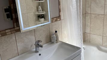 Hair dryer, towels, soap, toilet paper