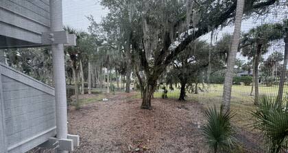 Plantation Nest-The Kerryman2. Screened porch overlooking 5th Tee Box
