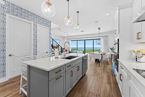 Fridge, microwave, oven, stovetop - NEW Luxury Modern Beachfront Villa w/ Heated Pool (Melbourne Beach)