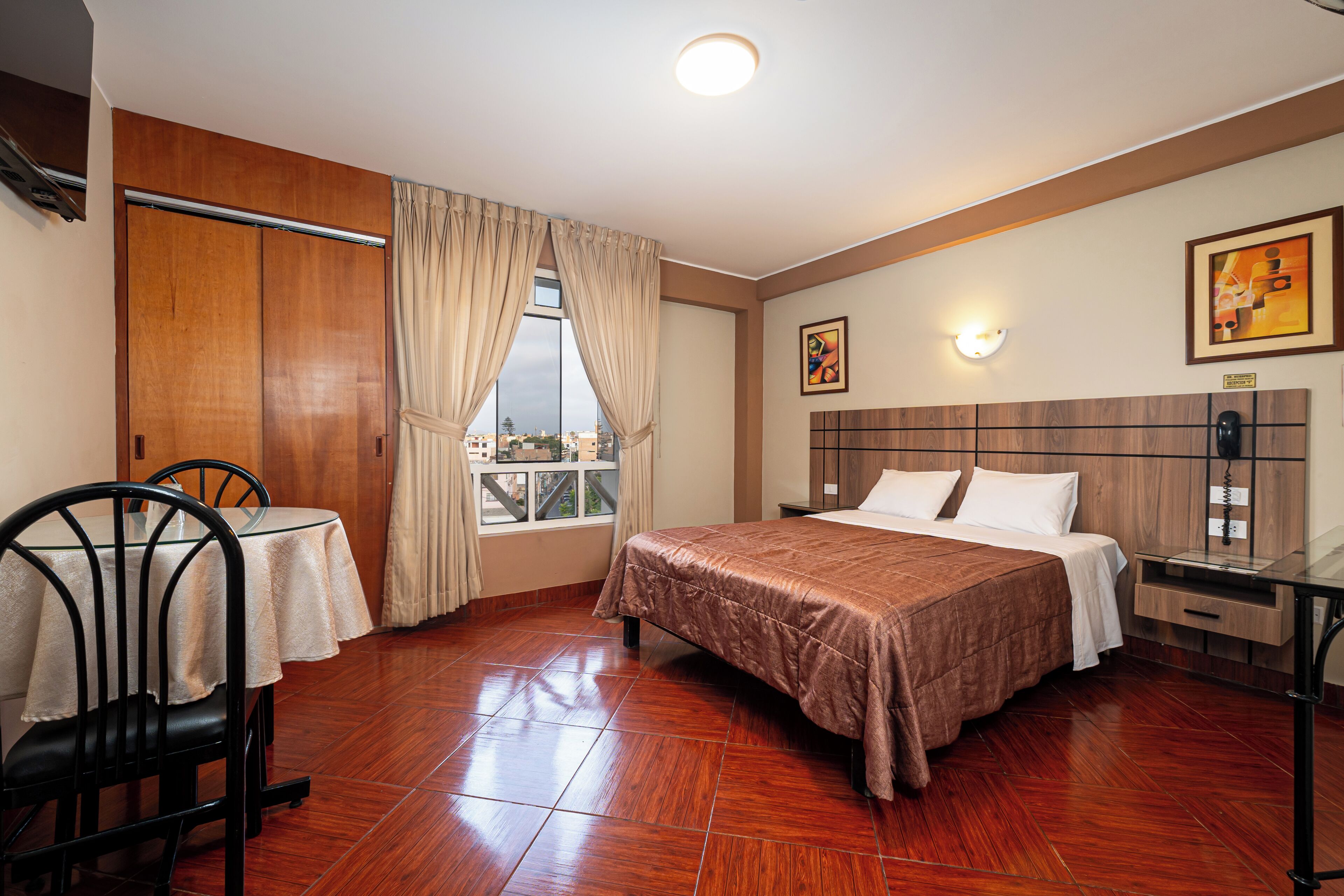 Premium bedding, desk, laptop workspace, free WiFi