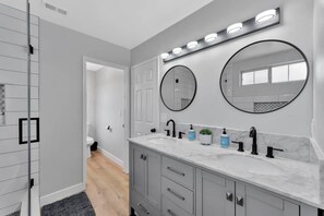 Shower, hair dryer, towels, soap