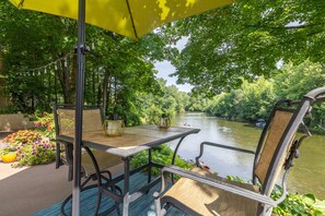Outdoor dining - Riverside retreat with hot tub on the Huron River! 10 miles to UofM! (Dexter)