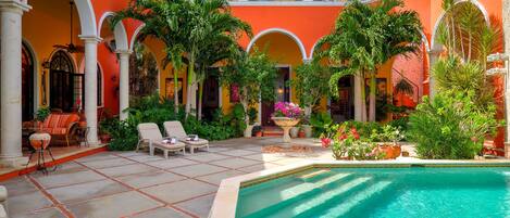 Outdoor pool, open 8:00 AM to 11:00 PM, sun loungers