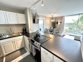 Condo | Private kitchen | Full-size fridge, microwave, oven, stovetop