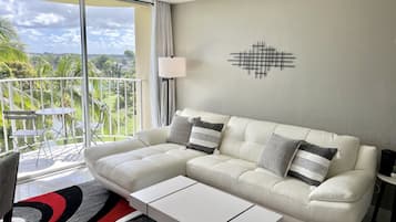 Condo | Living area | 40-inch flat-screen TV with cable channels, Netflix, streaming services