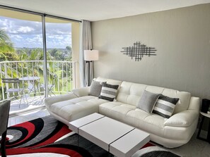 Condo | Living area | 40-inch flat-screen TV with cable channels, Netflix, streaming services - Stunning Views Best Locale Hilo 2BRCondo (Hilo)