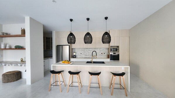 Luxury Villa | Private kitchen | Full-size fridge, microwave, oven, stovetop