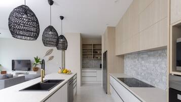 Luxury Villa | Private kitchen | Full-size fridge, microwave, oven, stovetop