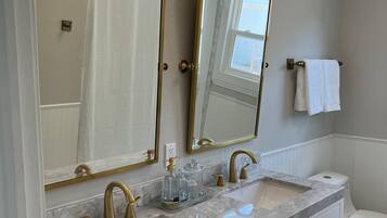 Hair dryer, towels, soap, toilet paper