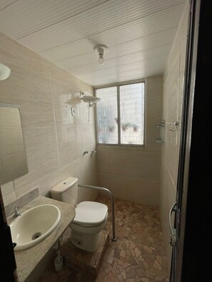 Shower, towels, toilet paper