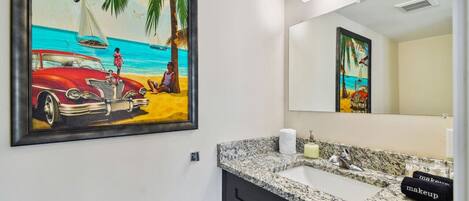 Cuban Suite – Downstairs half bath equipped with basic bathroom necessities for the sofa bed guests