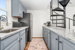 Fridge, microwave, oven, stovetop - Walk to Downtown & Campus Modern 2BR Condo (Auburn)