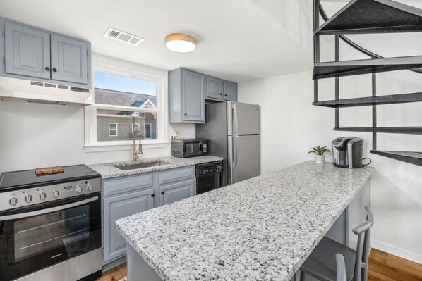 Fridge, microwave, oven, stovetop - Walk to Downtown & Campus Modern 2BR Condo (Auburn)