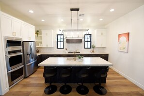 Fridge, microwave, oven, stovetop - Black Ridge Villa near Sand Hollow & Zions. Sleeps 32. Private pool & hot tub.  (Hurricane)