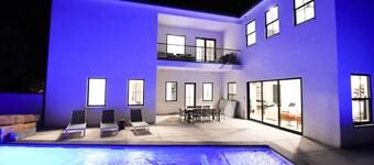 Black Ridge Villa near Sand Hollow & Zions. Sleeps 32. Private pool & hot tub. 