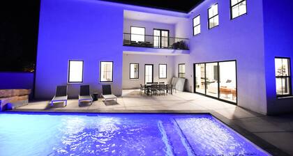Black Ridge Villa near Sand Hollow & Zions. Sleeps 32. Private pool & hot tub.