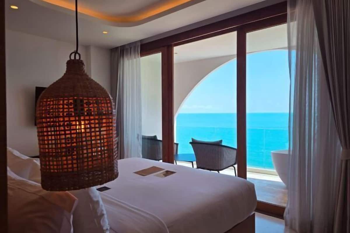 Premium bedding, pillow-top beds, free minibar items, desk