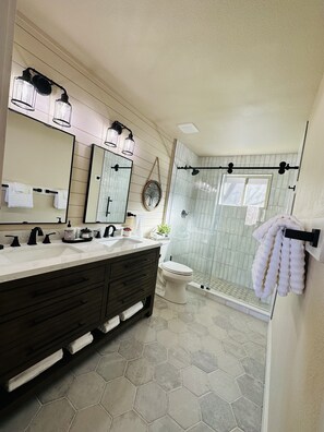 Shower, hair dryer, towels, soap