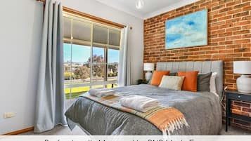 4 bedrooms, iron/ironing board, travel cot, WiFi