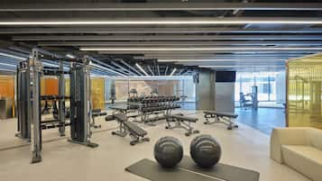 Stay fit and active in our well-equipped gym featuring weight machines, dumbbells, and exercise balls.