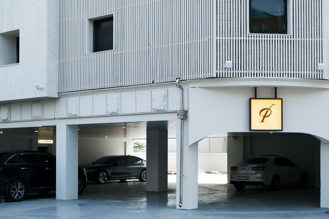 A modern building with a parking garage.