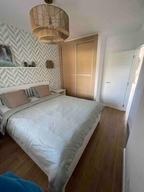 1 bedroom, iron/ironing board, travel crib, internet