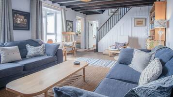 32-inch Smart TV with cable channels, fireplace