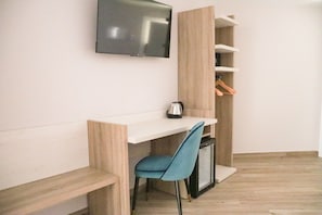 Suíte estúdio luxo | Roupas de cama premium, edredons de pluma, frigobar, cofres nos quartos