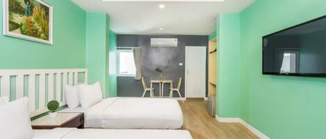 Habitación Deluxe | Escritorio, wifi gratis y ropa de cama