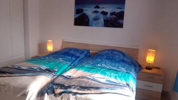 2 bedrooms, desk, iron/ironing board, travel crib