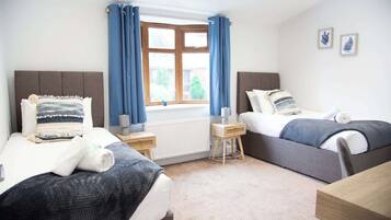 3 bedrooms, desk, iron/ironing board, travel cot