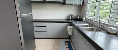 Fridge, electric kettle, cookware/dishes/utensils