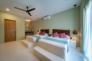 Family Room | 1 bedroom, premium bedding, minibar, in-room safe