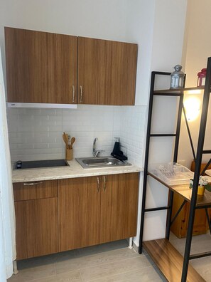 Fridge, oven, electric kettle, cookware/dishes/utensils