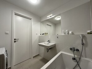 Hair dryer, towels, soap, shampoo