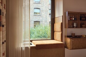 1 غرفة نوم وملاءات من القطن المصري وأغطية فراش متميزة وميني بار