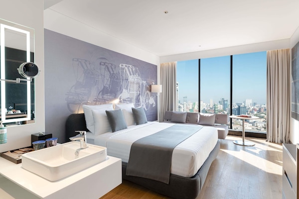 Executive Room, 1 King Bed | 1 bedroom, down comforters, minibar, desk