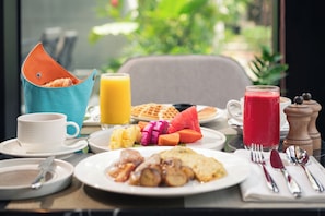 Daily buffet breakfast (USD 15 per person)