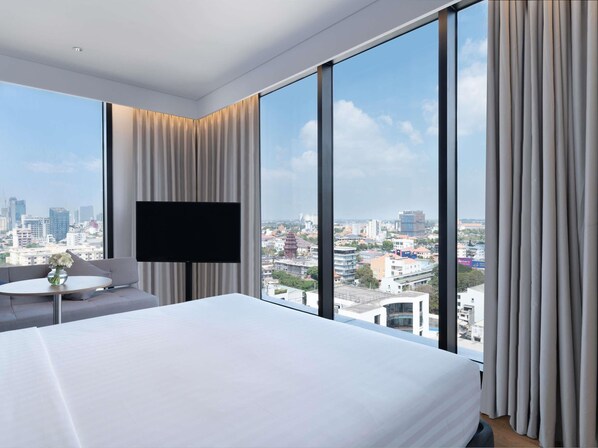 Deluxe Room, 1 King Bed | 1 bedroom, down comforters, minibar, desk