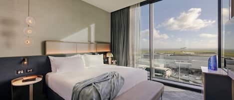 Suite exécutive, 1 trÚs grand lit | Literie de qualité, minibar, coffre-fort, décor unique