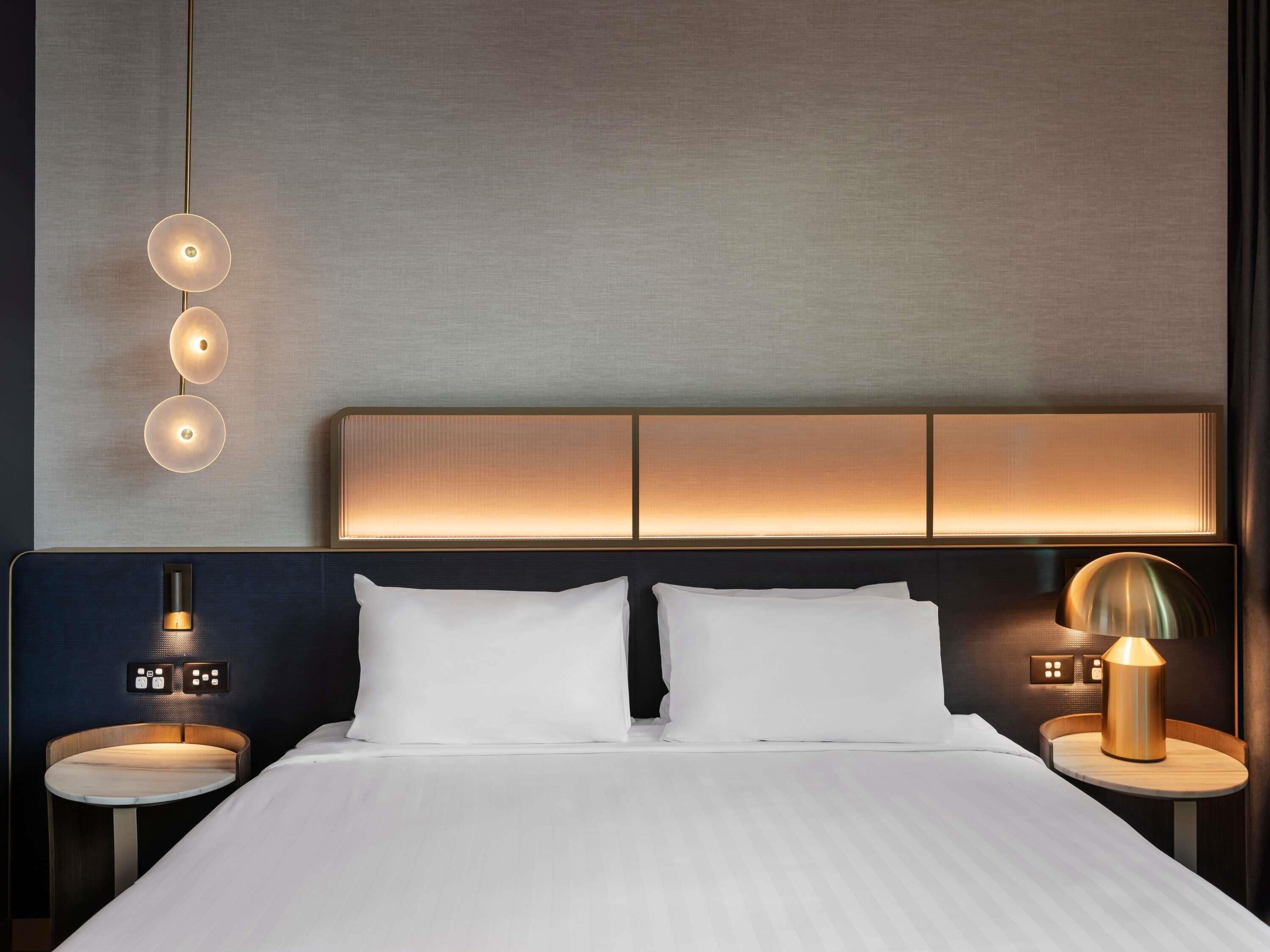 Executive Suite, 1 King Bed | Premium bedding, minibar, in-room safe, individually decorated