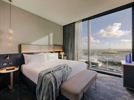 Executive Suite, 1 King Bed | Premium bedding, minibar, in-room safe, individually decorated