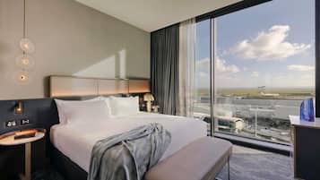 Suite ejecutiva, 1 cama King size | Ropa de cama de alta calidad y minibar