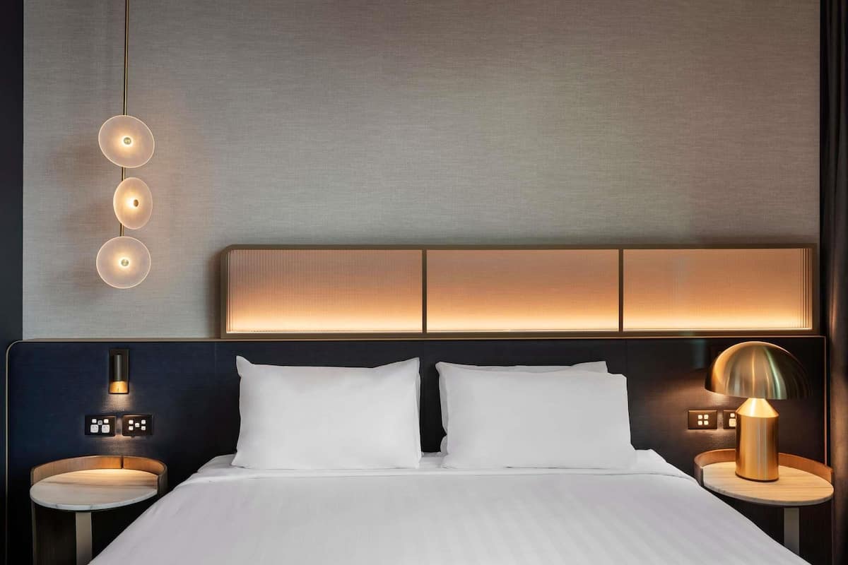 Executive Suite, 1 King Bed | Premium bedding, minibar, in-room safe, individually decorated