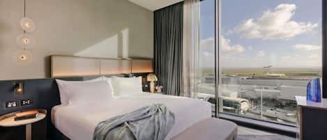 Executive Suite, 1 King Bed | Premium bedding, minibar, in-room safe, individually decorated