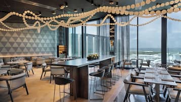 Breakfast, lunch, dinner served; local and international cuisine