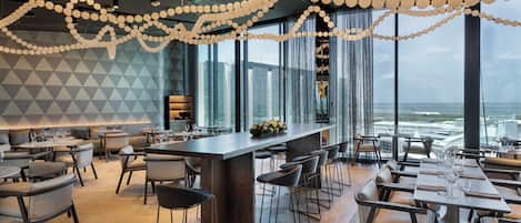 Breakfast, lunch, dinner served; local and international cuisine